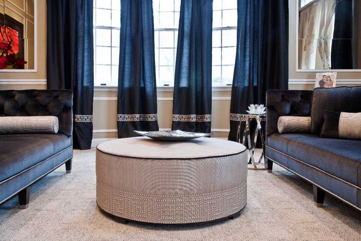 This ottoman remains one of the all time favorite designs I have created in this Old Brookville New York home interior design by Robyn B of Interiors By Just Design.