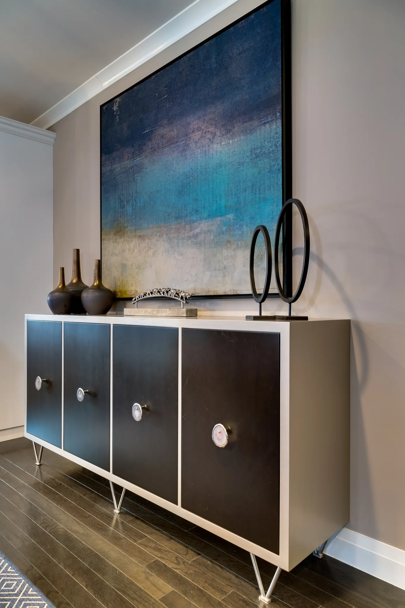 dining room wall with large beach style artwork