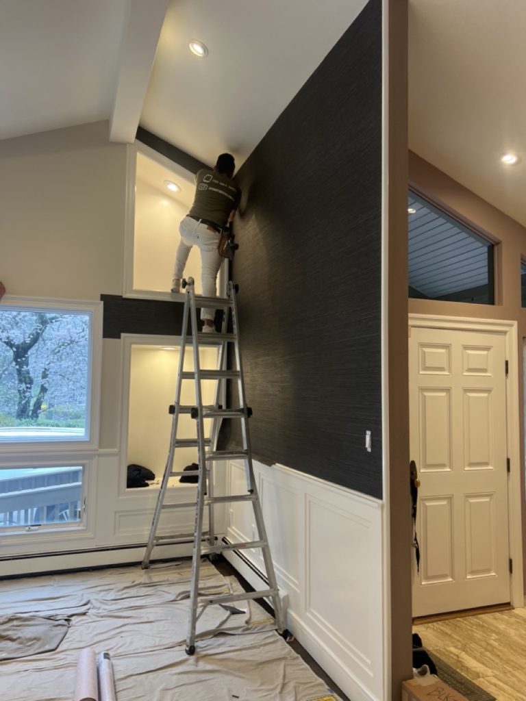 sitting room ceiling trim being painted