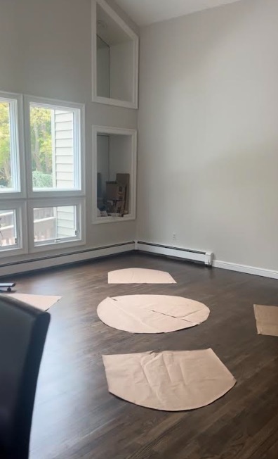 cut outs of furniture footprints used to design the room